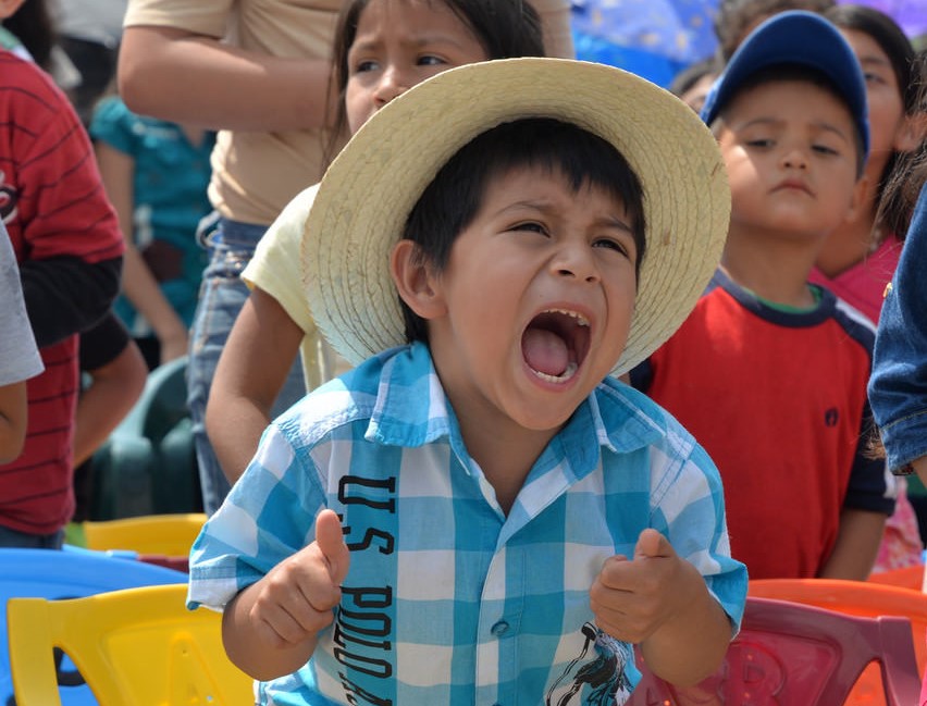 little hispanic boy yelling