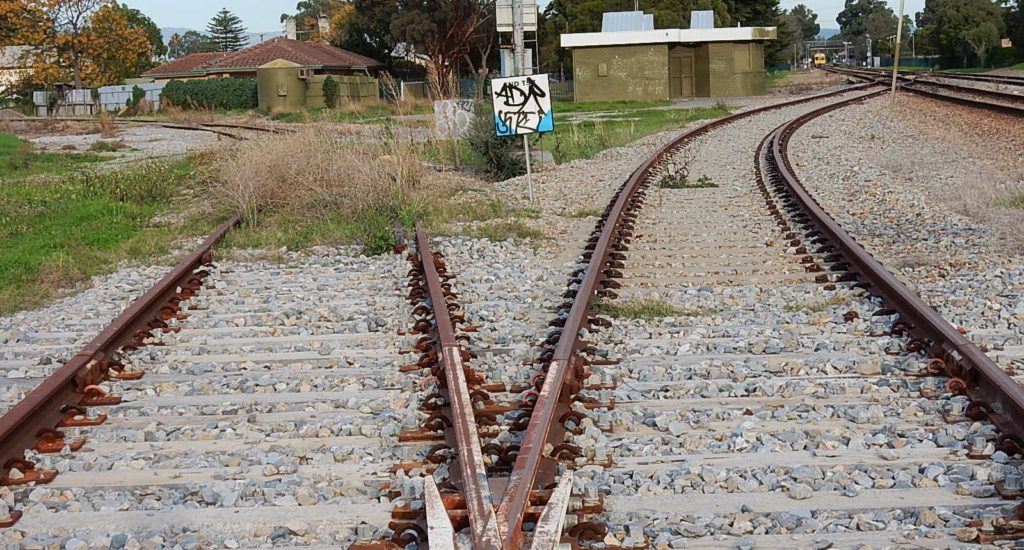 two diverging paths for train tracks