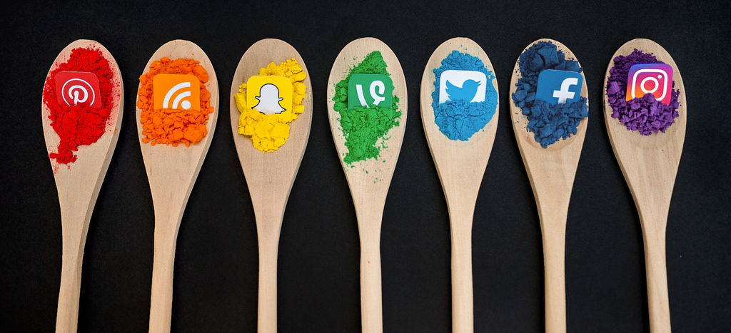 spoons with social media ocons on them